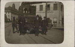 Men Posing With Train Engine Postcard