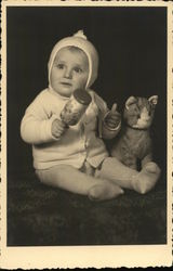 Baby with Rattle and Stuffed Cat Postcard