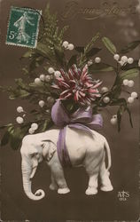 Bouquet Tied with Purple Bow Atop Carved Elephant Postcard