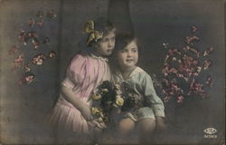 Two Children Posing with Flowers - Hand Colored Postcard Postcard