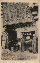 Two men in front of a shop Arab Postcard Postcard