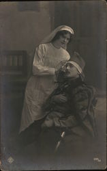 Nurse treating soldier World War I Postcard Postcard