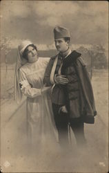 Nurse and wounded soldier Postcard