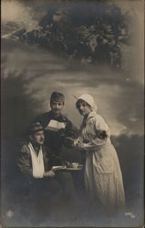 Nurse treating two soldiers Postcard