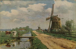 A windmill by a creek with cows Postcard