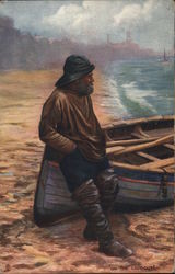 Man Leaning Against Rowboat on Shoreline Canoes & Rowboats Postcard Postcard