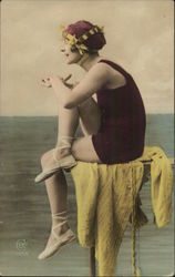 Art Deco Woman in Swimsuit Sitting by Shore Postcard