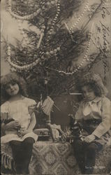 Girls with Dolls & Christmas Tree Children Postcard Postcard