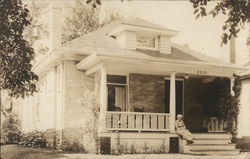 Man on Front Porch of Home Buildings Postcard Postcard Postcard