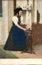 Woman working on a loom Postcard