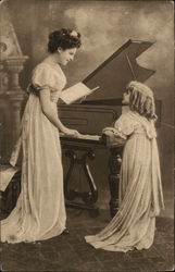 Woman plays piano as child looks on Postcard