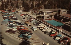 Overlooking the Aquacourt and Parking Space at Radium Hot Springs Postcard