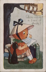 Halloween Greeting with Child Dressed as Pumpkin Reading with a Cat Postcard