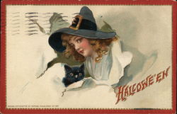 A beautiful witch and her black cat burst through a wall with Halloween written on it Postcard Postcard Postcard