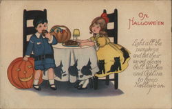 Halloween - Girl and Boy Eating a Cookie Postcard