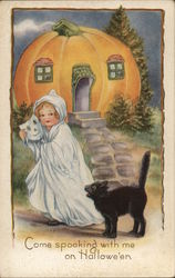 Child dressed as a Ghost with Cat and a Pumpkin shaped House Postcard