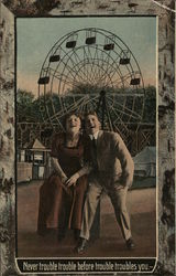 Couple in Front of Ferris Wheel Amusement Parks Postcard Postcard