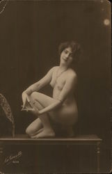 Naked Woman Posing on Table Risque & Nude Postcard Postcard