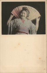 Laughing geisha woman Postcard