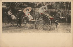 Women taking a ride on hand-pulled rickshaws Japan Postcard Postcard