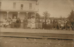 Group of People Waiting at Train Station Postcard