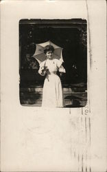 Woman Holding Umbrella Postcard