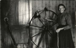 Old Woman Standing by Spinning Wheel Postcard