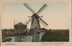 Dutch windmill near canal Postcard