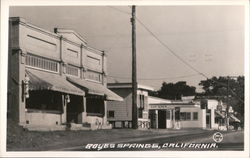 Street Scene - Barber Shop, Gas Station Postcard