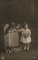 Girl Holding Horseshoes and Calendar Postcard