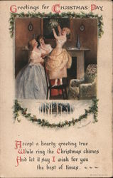 Young Women Hanging Mistletoe Postcard