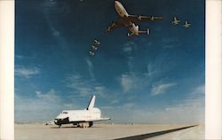 N.A.S.A.'s 747 and T-38 chase planes salute a successful landing of Space Shuttle "Enterprise". Postcard