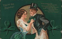 Erin go Bragh; A woman attaches a shamrock to a man's coat Postcard