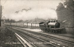 L&NW Irish Mail Taking Water at Bushey Troughs Postcard