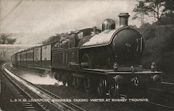 L&NW Liverpool Express Taking Water at Busey Troughs Postcard