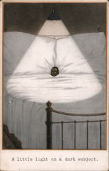 Black boy in bed underneath light: "A little light on a dark subject" Black Americana Postcard Postcard Postcard