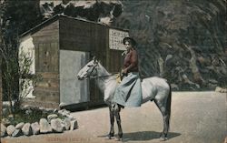 Woman seated on horse in front of shack Cowboy Western Postcard Postcard Postcard