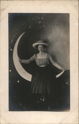 Woman Posing on Crescent Paper Moon Postcard