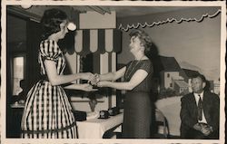 Young Woman Receiving an Award Postcard