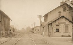 Girl Standing Outside Train Station Pennsylvania, Ohio? Postcard