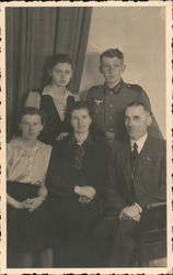 Young Soldier and Family, Nazi Uniform? Postcard