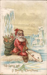 Santa riding a polar bear among icebergs Santa Claus Postcard Postcard Postcard