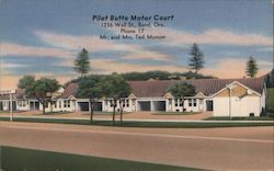 Pilot Butte Motor Court - 1236 Wall Street - Mr and Mrs Ted Munson Postcard