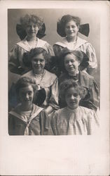 Six young women wearing big bows Postcard