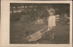 Boy Playing With Wood Wheelbarrow Postcard