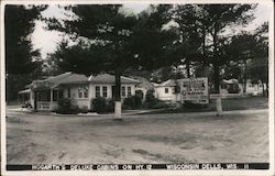 Hogarth's Deluxe Cabins on Hy. 12 Postcard