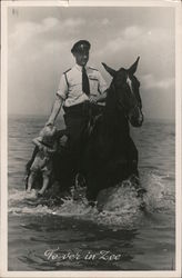 Te Ver in Zee: Policeman on Horse Rescuing Toddler in Water Postcard