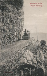 Train on Sensation Rock, Ceylon Railway Postcard