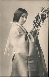 A lady holding flowers Postcard