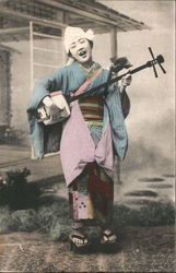 A Geisha lady singing happily Japan Postcard Postcard Postcard